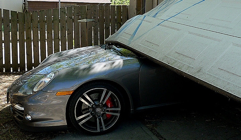 Car Crash Son Launches Porsche Turbo Press Car Through Garage Door