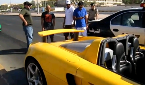 Car Crash Yellow Porsche Carrera GT in the Middle East