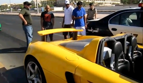 Car Crash Yellow Porsche Carrera GT in the Middle East
