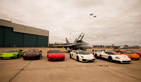 Race the Base 2010 cars posing with the CF-18 Fighter Jet